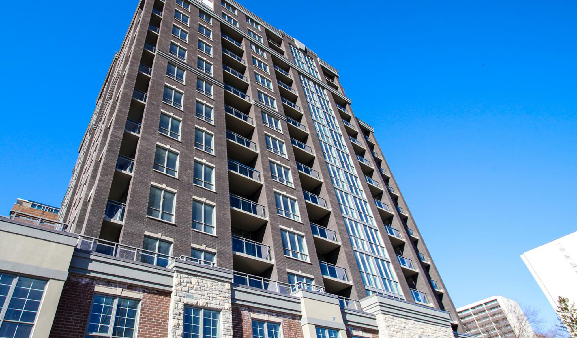 Exterior of The Brock condominium building